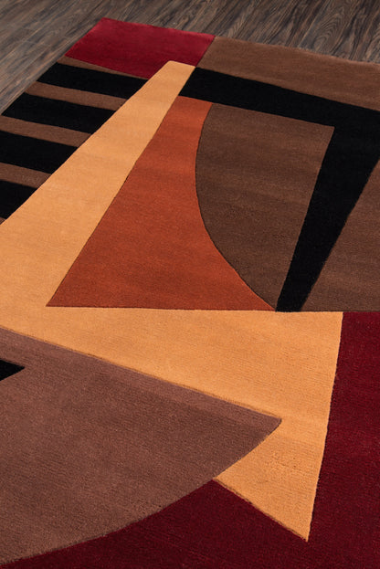 Modern geometric area rug with warm brown, tan & orange blocks, red accents & black lines; soft plush pile.