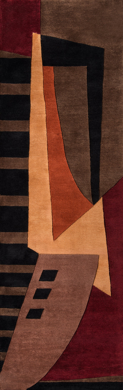 Abstract geometric runner rug in warm earth tones: tan, brown, black, red and peach with angular shapes.
