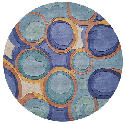Round abstract wall art with overlapping blue, teal and orange rings and a textured canvas look.