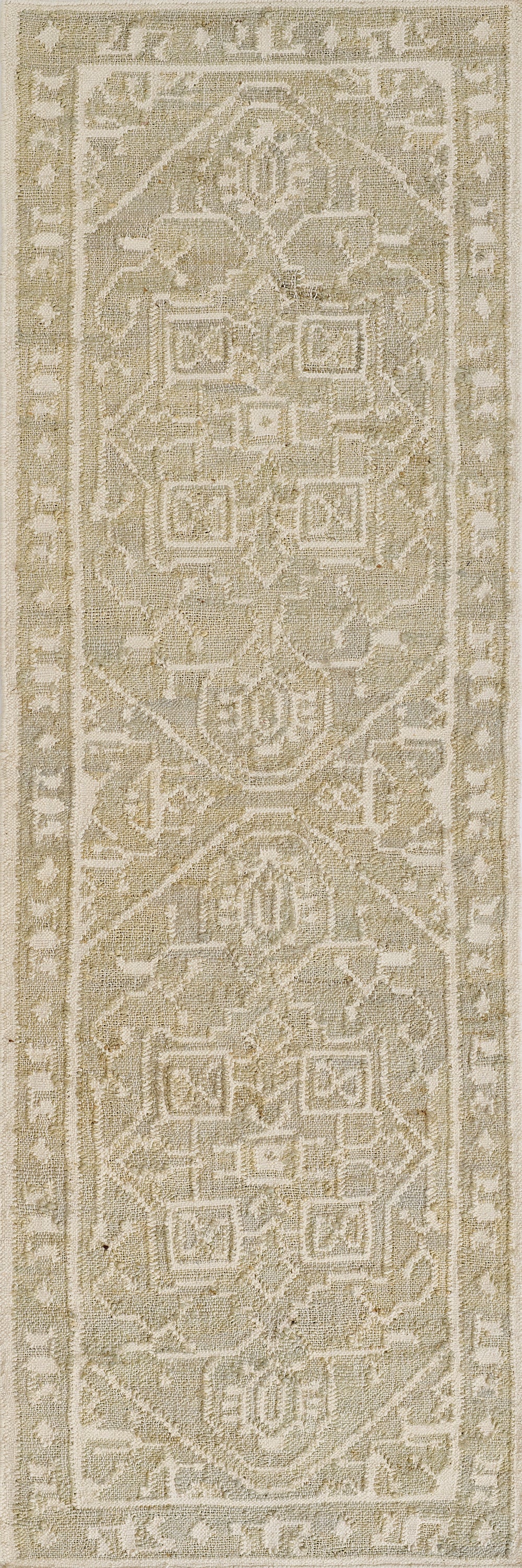 Blue distressed oriental rug with geometric medallions and a scroll border; soft textured pile.