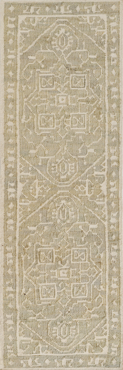 Blue distressed oriental rug with geometric medallions and a scroll border; soft textured pile.