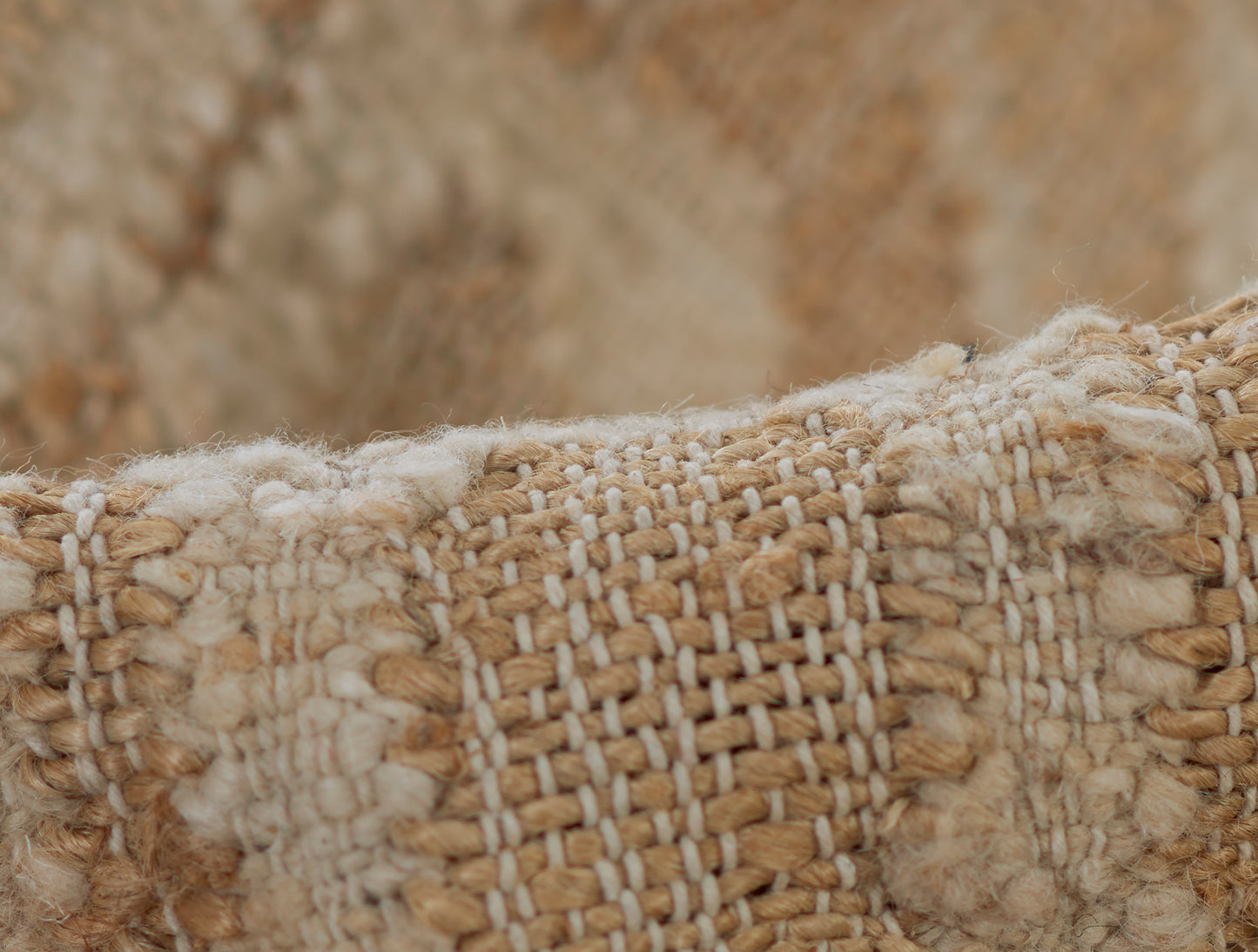 Natural beige woven rug with chunky cream loops and thick fiber texture; rustic home decor accent.