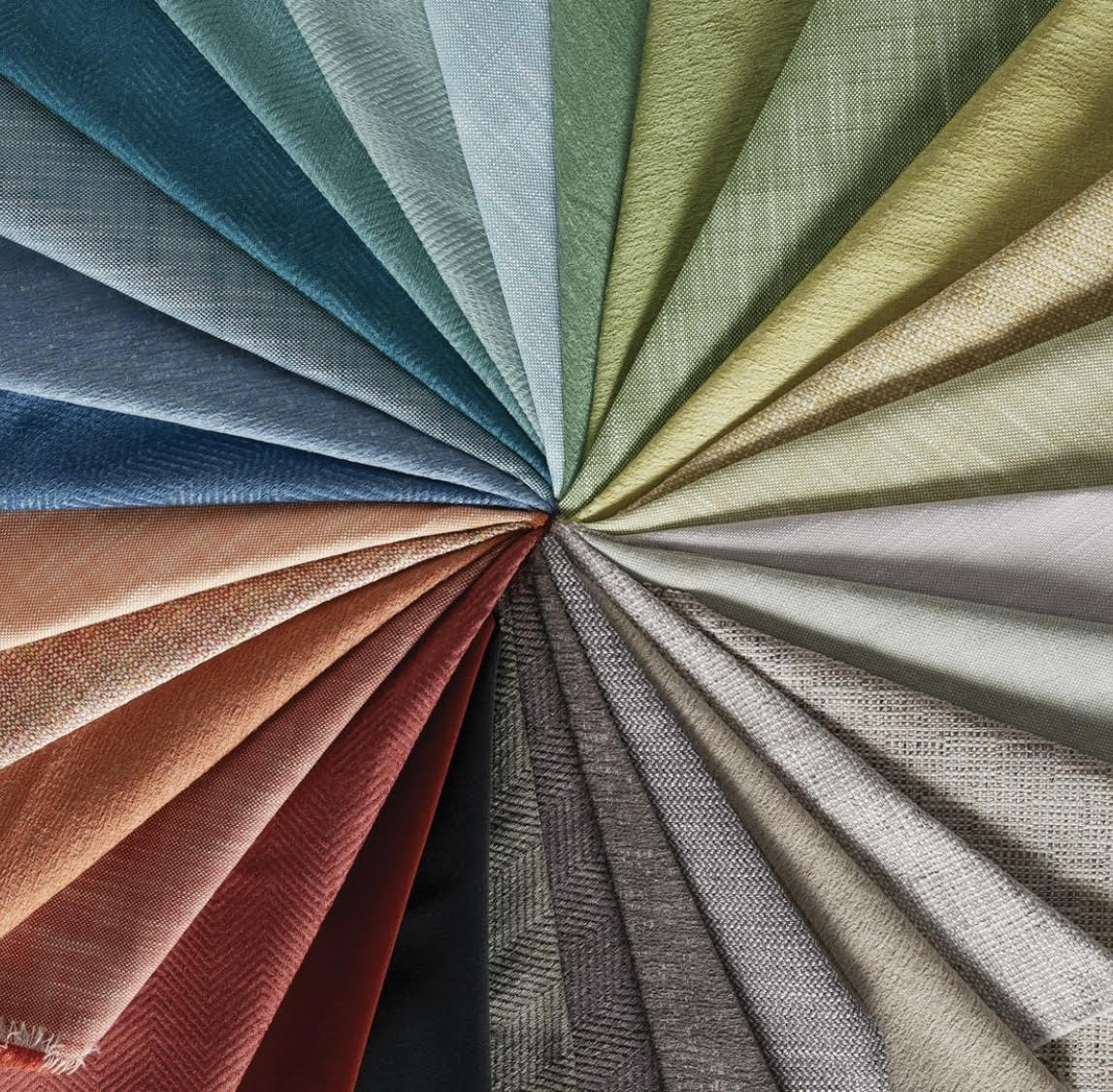 Circular arrangement of fabric swatches in various colors