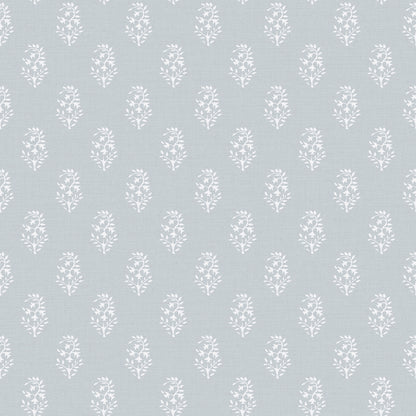Soft blue wallpaper with repeating white floral motifs arranged in vertical bouquets.