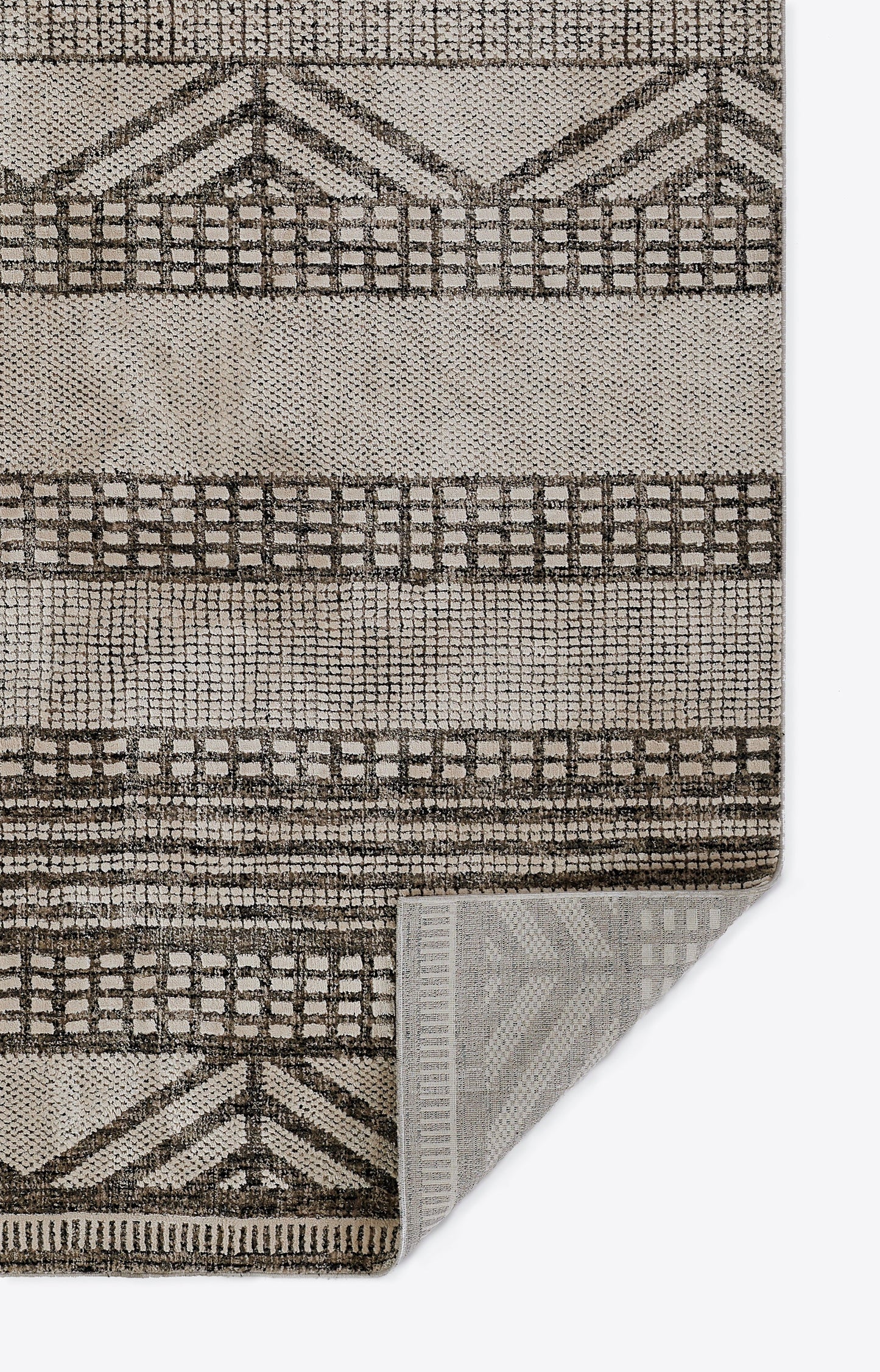 Neutral beige and tan geometric area rug with grid and chevron motifs; woven texture, rectangular for living room decor.