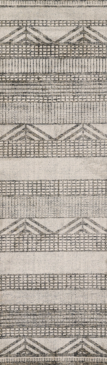 Neutral beige and charcoal woven rug with chevron and lattice geometric stripes, textured pattern.