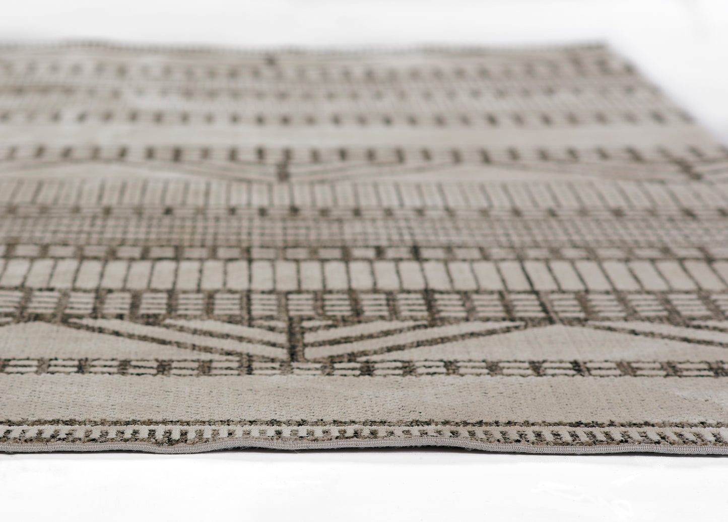 Beige & taupe woven rug, 2' x 3', with geometric chevron & stripe motifs; rectangular area rug for living spaces.