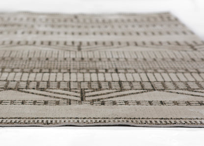 Beige & taupe woven rug, 2' x 3', with geometric chevron & stripe motifs; rectangular area rug for living spaces.