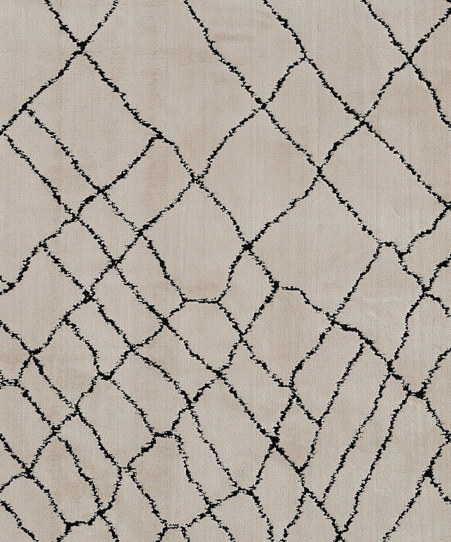 Beige rug with irregular black diamond lattice pattern; modern geometric decor.