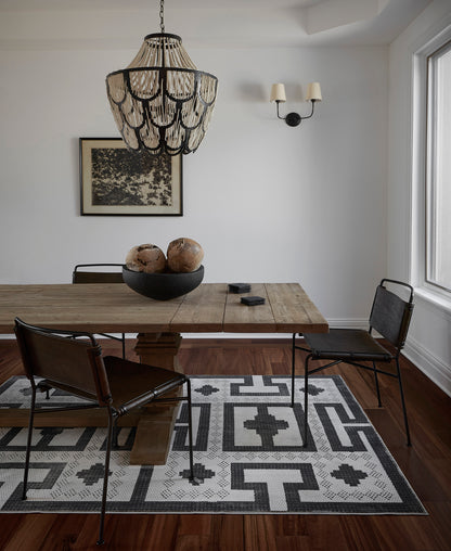 Geometric gray rug with a woven texture (2' x 3').