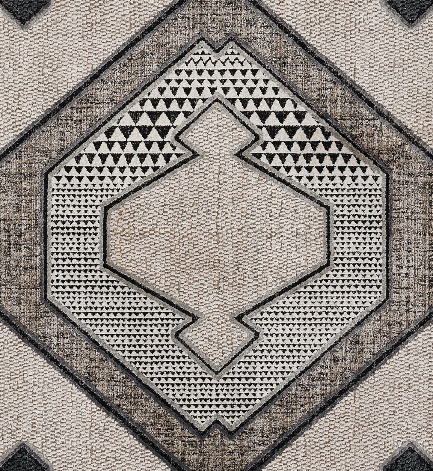 Beige and charcoal geometric area rug with layered diamond medallion and triangle motifs, textured woven surface.