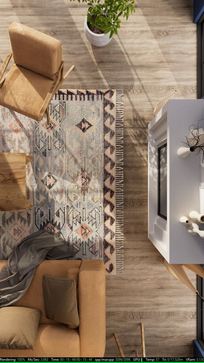 Top-down view of living room with tan sofa and chair, patterned rug, wooden floor, coffee table, potted plant, fireplace.