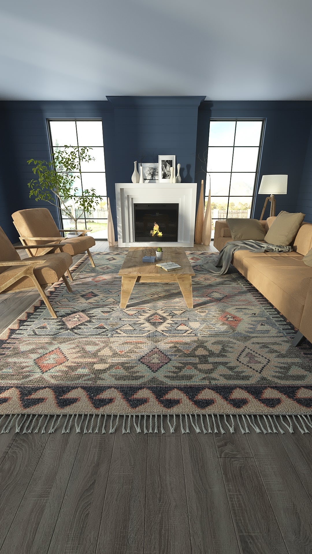 Geometric blue and neutral area rug with fringe, in a modern living room with tan sofa, wood coffee table, and navy walls.