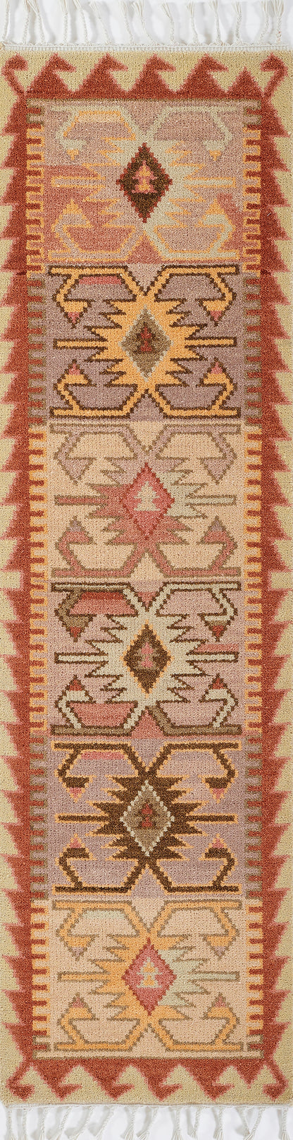 NomadNom tribal kilim runner rug with geometric diamonds in pink, peach, beige, gold and brown; ivory fringe.