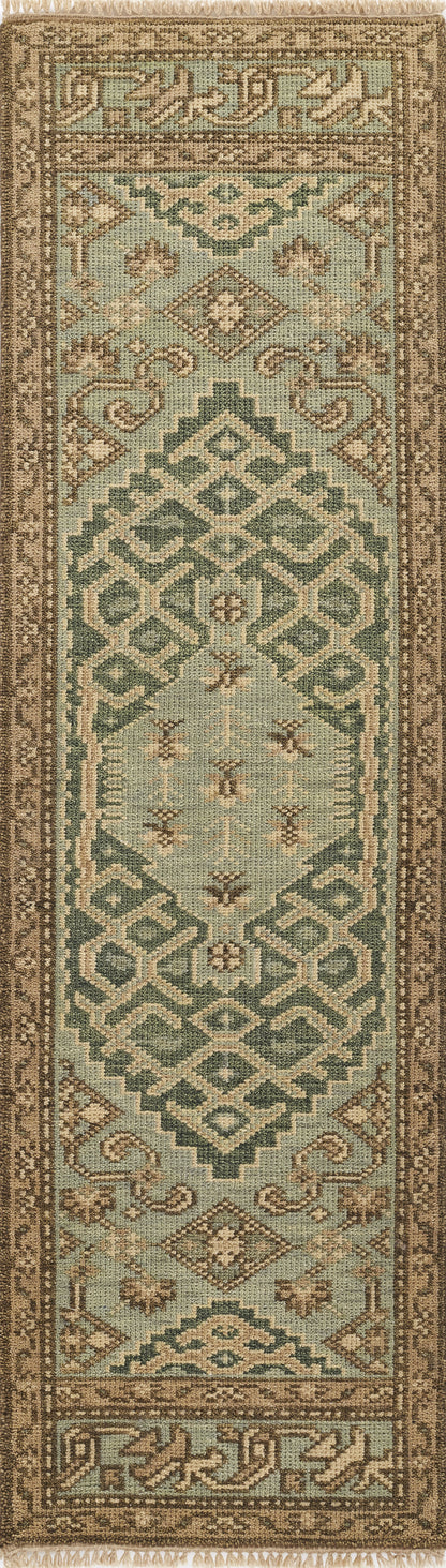 Nomad-style hallway runner rug in teal and beige with geometric medallions and scrolling borders.