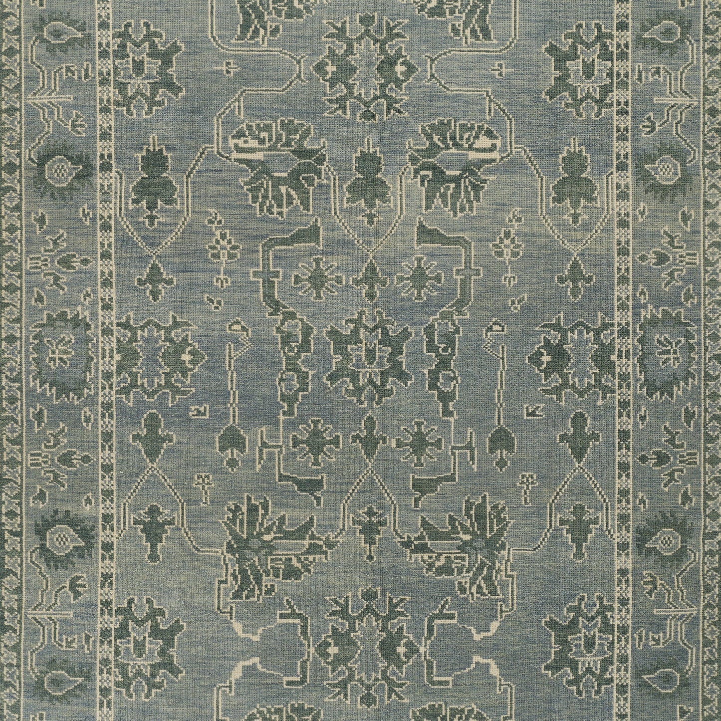 Blue and ivory traditional oriental rug with intricate floral medallions and border, decorative area rug.