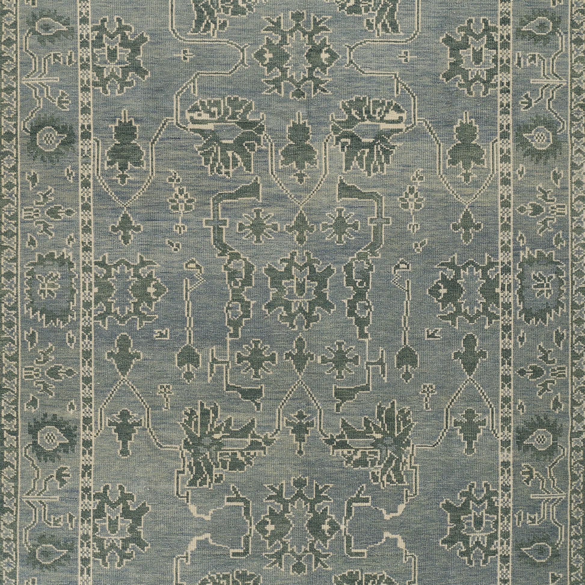 Blue and ivory traditional oriental rug with intricate floral medallions and border, decorative area rug.