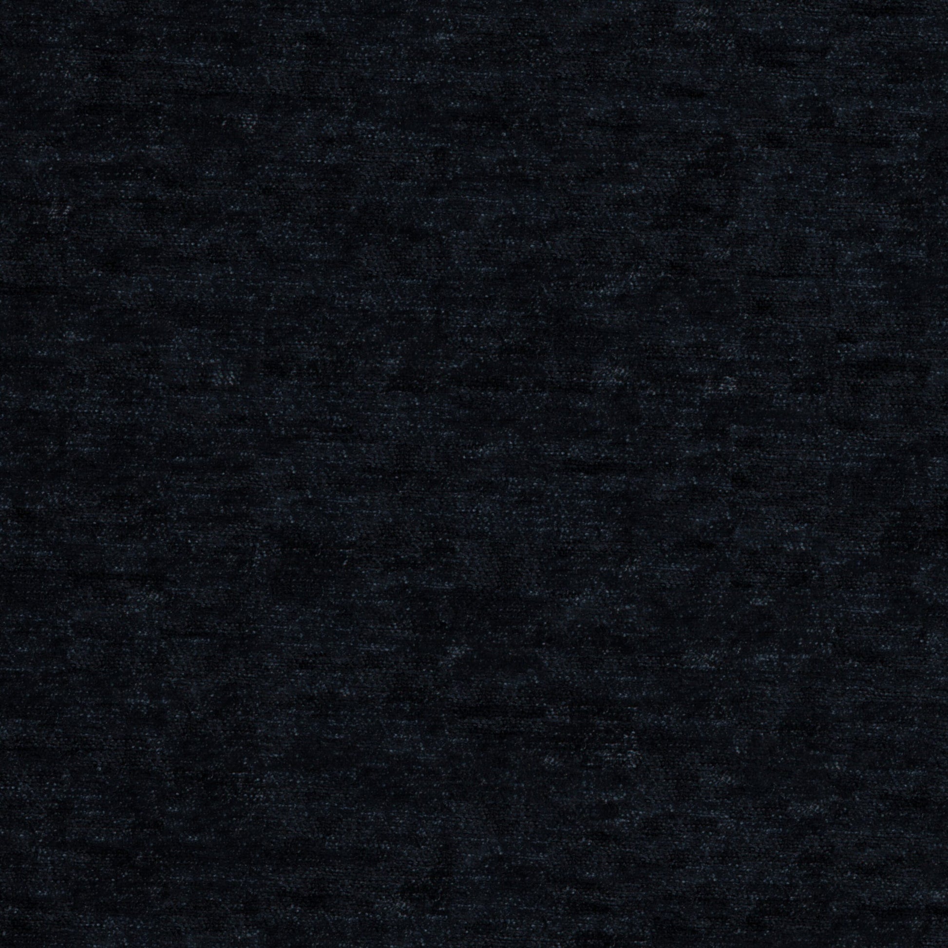 Plain black chenille fabric close-up with a soft, plush texture.