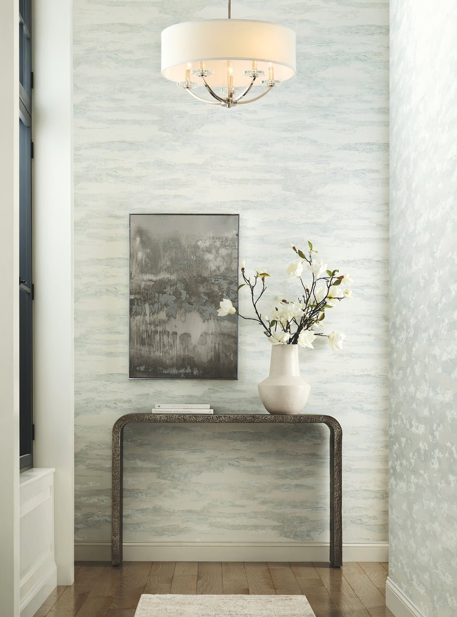 Candice Olson Artistic Tides textured wallpaper in soft spa blue, beige, and ivory with organic flowing lines and subtle metallic-like shimmer, inspired by coastal waves and sand dunes.