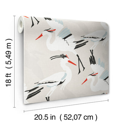 Roll of tan wallpaper featuring white cranes with red beaks on tan background with dark accents; 18 ft long, 20.5 in wide; peel & stick.
