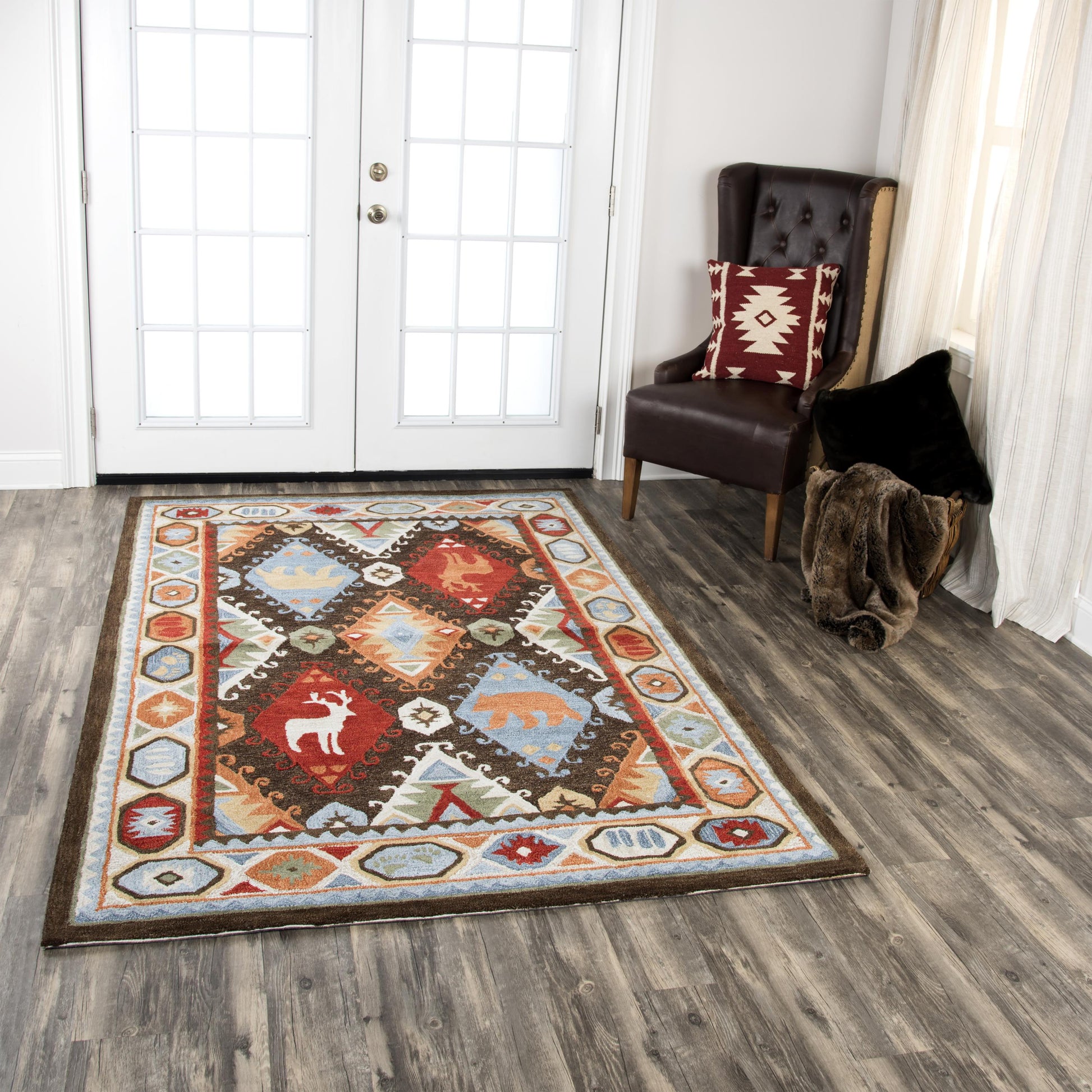 Rug with rustic lodge design, 5' x 8'.