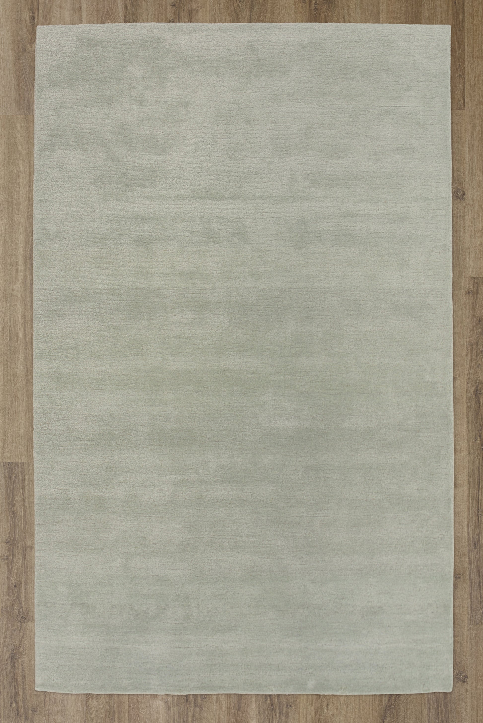 Area rug, 8' x 10', ocean-inspired pattern.