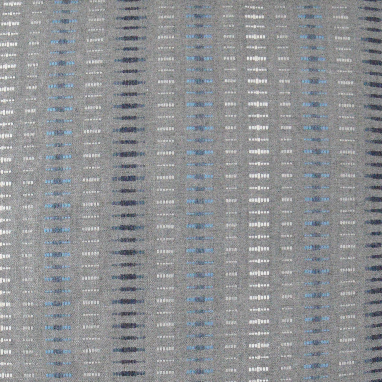 Outdoor lumbar pillow in bluestone stripe; gray woven fabric with vertical blue and white dashed stripes