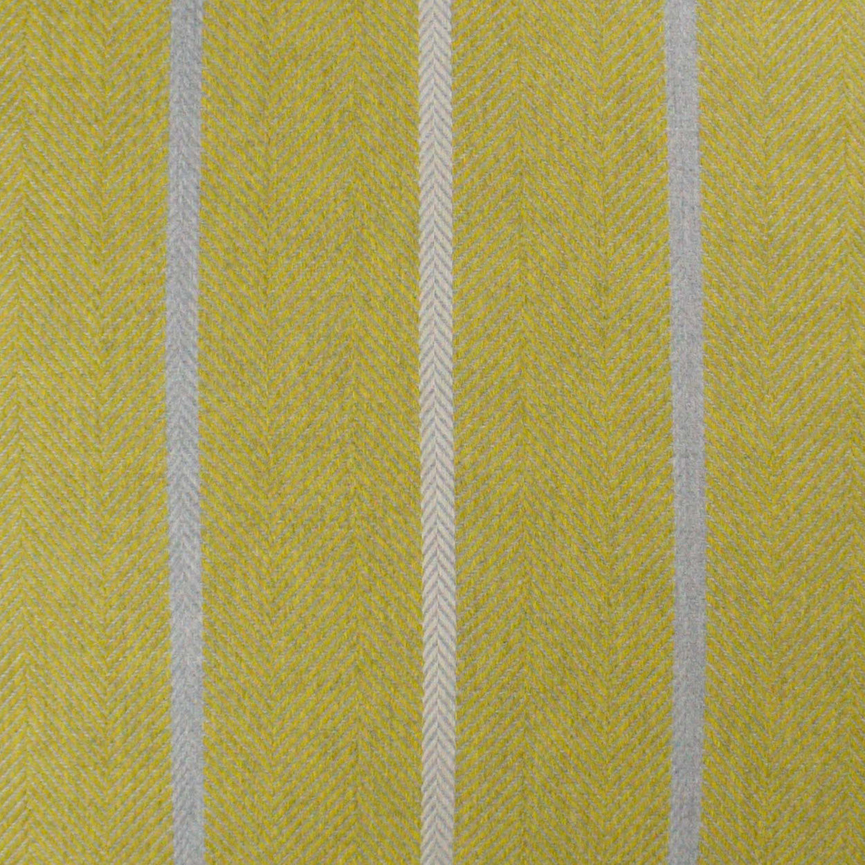 Mustard yellow textured fabric with pale gray vertical stripes and herringbone weave, suitable for upholstery.