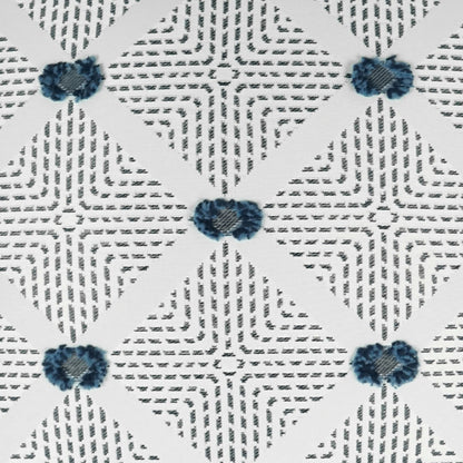 Outdoor lumbar pillow with white fabric, gray dash lattice pattern & blue embroidered flower clusters at diamond intersections; 12" x 24