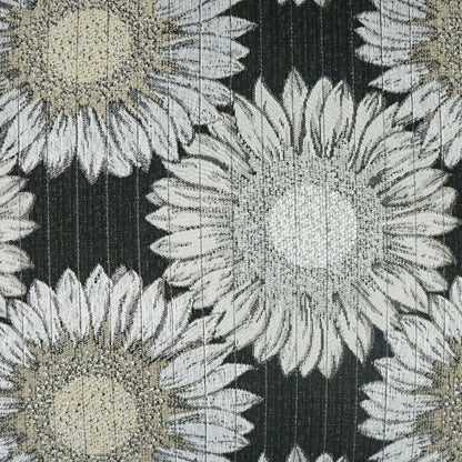 Outdoor lumbar pillow featuring a black daisy-chain floral pattern.