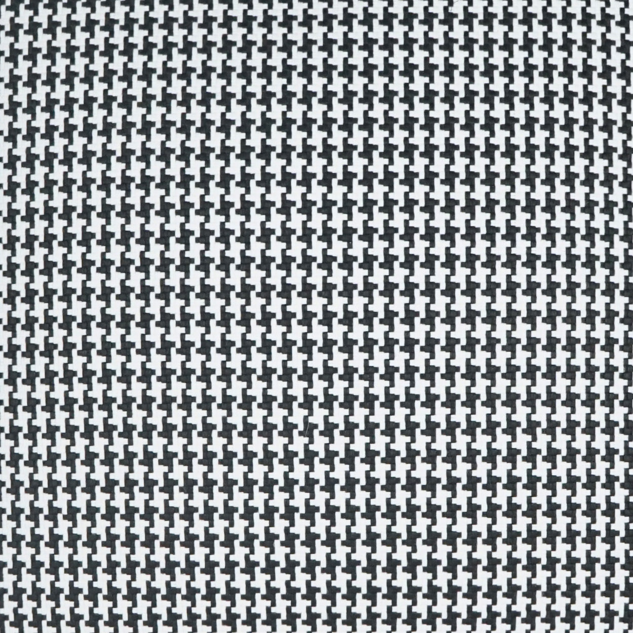 Black and white houndstooth fabric pattern; classic woven textile for suits, jackets or accessories.