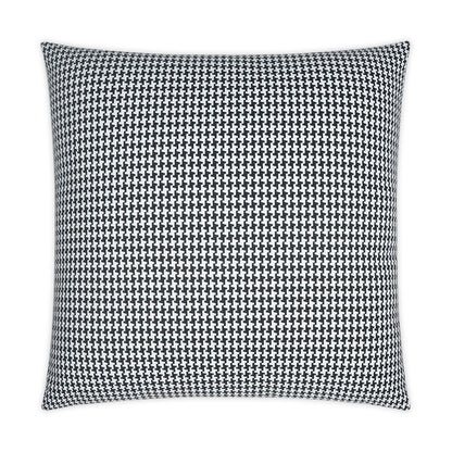 Square throw pillow in black-and-white houndstooth pattern, decorative home accessory.