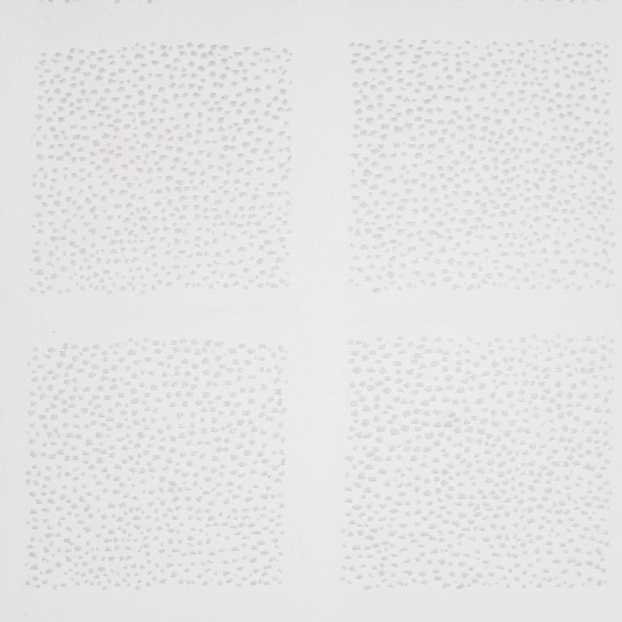 Light gray dotted fabric squares arranged in a 2x2 grid.
