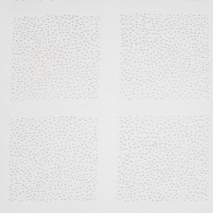 Light gray dotted fabric squares arranged in a 2x2 grid.