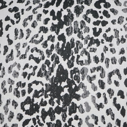 Outdoor pillow with charcoal animal print on a gray background; black irregular spots, 22" x 22