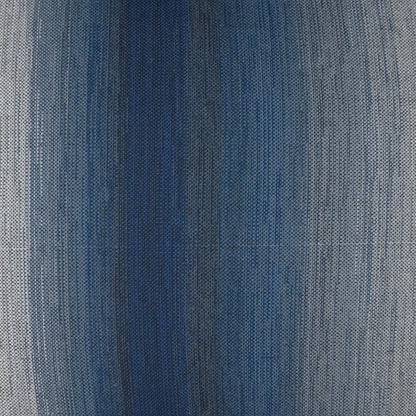 Close-up blue denim fabric with subtle fade, tight twill weave, casual jean-style textile.