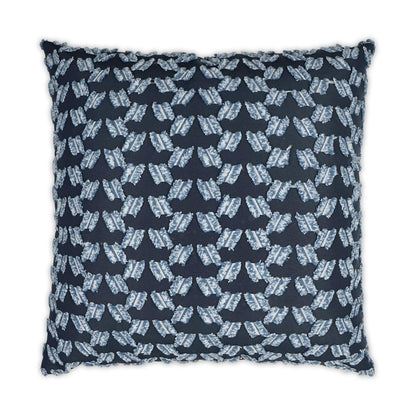 Navy throw pillow with pale blue leaf-shaped motif and fringed edges.