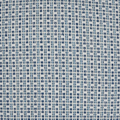Light blue-gray outdoor pillow with woven fabric & repeating navy blue dotted vertical stripes.