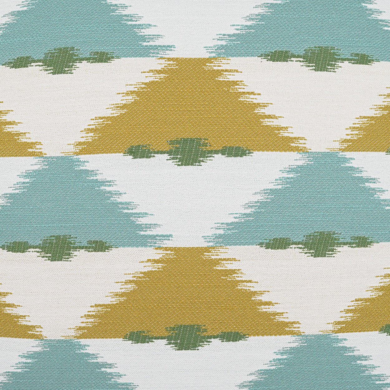 Outdoor lumbar pillow, 12" x 24", with teal and mustard triangular ikat pattern on woven fabric.