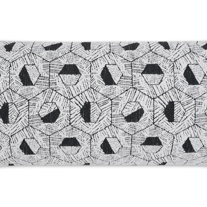 Outdoor lumbar pillow with light grey woven fabric and black geometric circular motifs in a repeating hexagonal pattern (12" x 24").