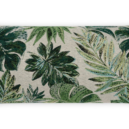 Green tropical leaf print outdoor lumbar pillow with beige background.
