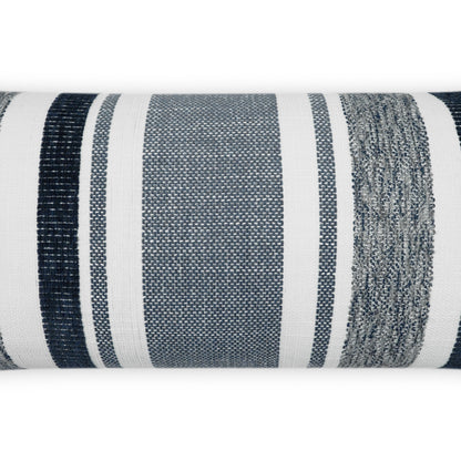 Outdoor lumbar pillow with indigo striped woven fabric; navy and white stripes.