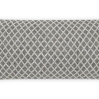 Outdoor lumbar pillow with woven fabric featuring a diamond lattice pattern and a textured surface.