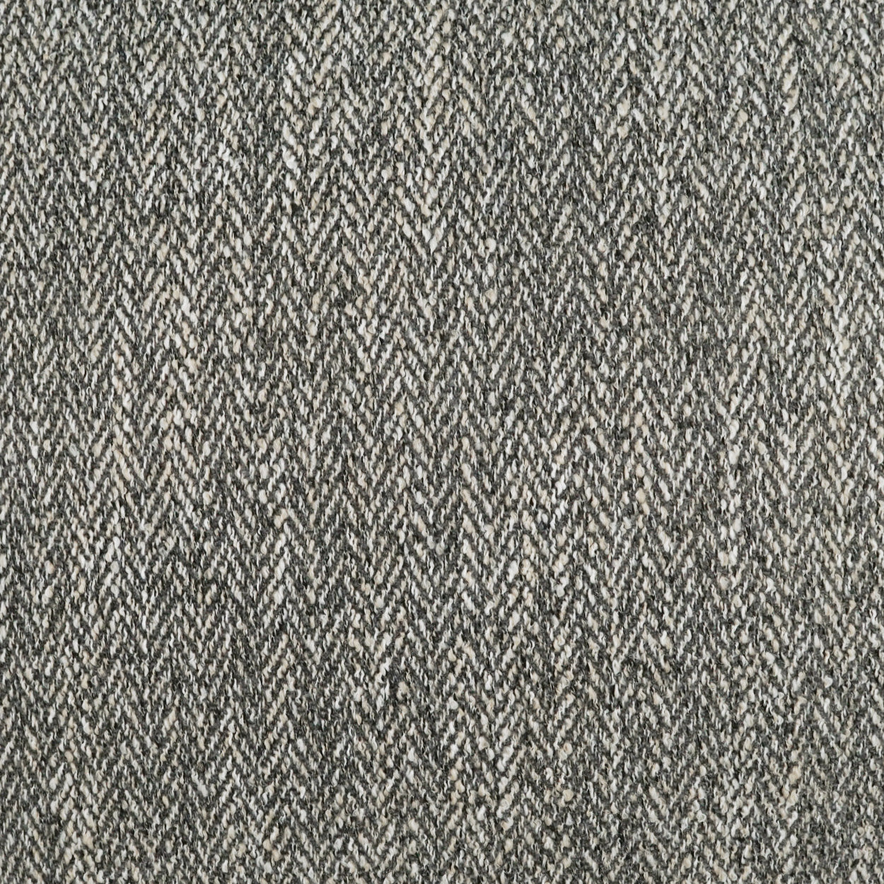Gray textured chevron fabric on an outdoor Stratford pillow, 22" x 22".
