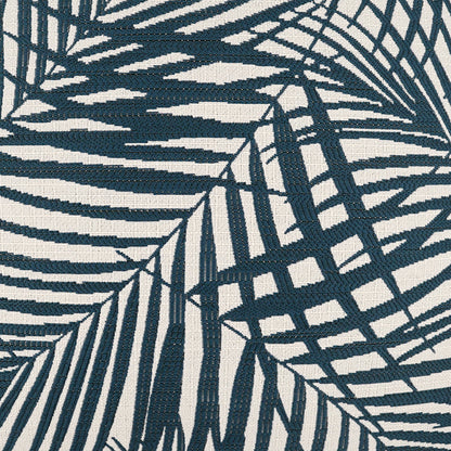 Teal palm leaf print on cream fabric; tropical botanical textile with bold leaf pattern.
