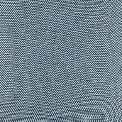 Blue denim-style herringbone fabric with subtle white flecks; durable woven textile for jackets or upholstery.