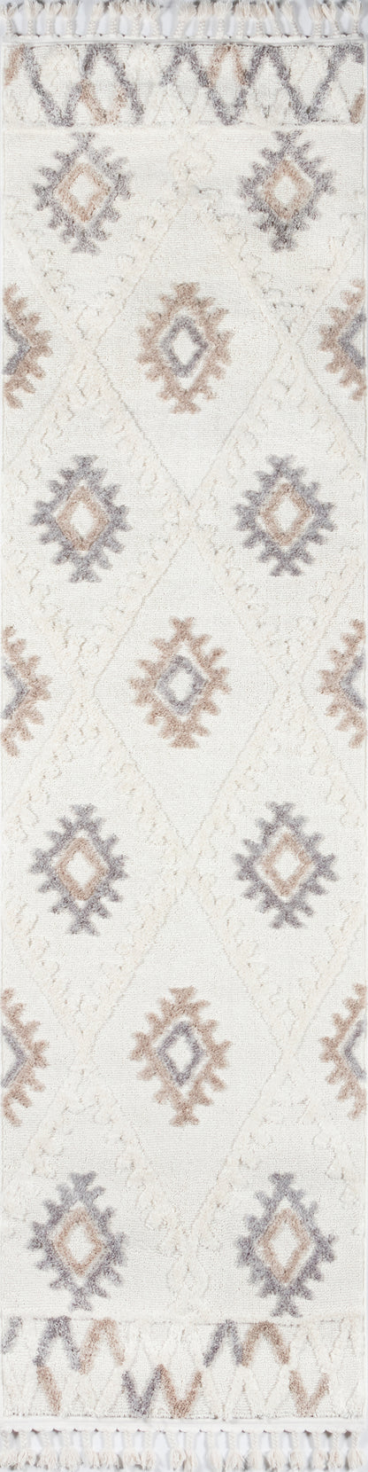 Ivory runner rug with pastel diamond medallions in taupe, lavender, beige; fringed ends.