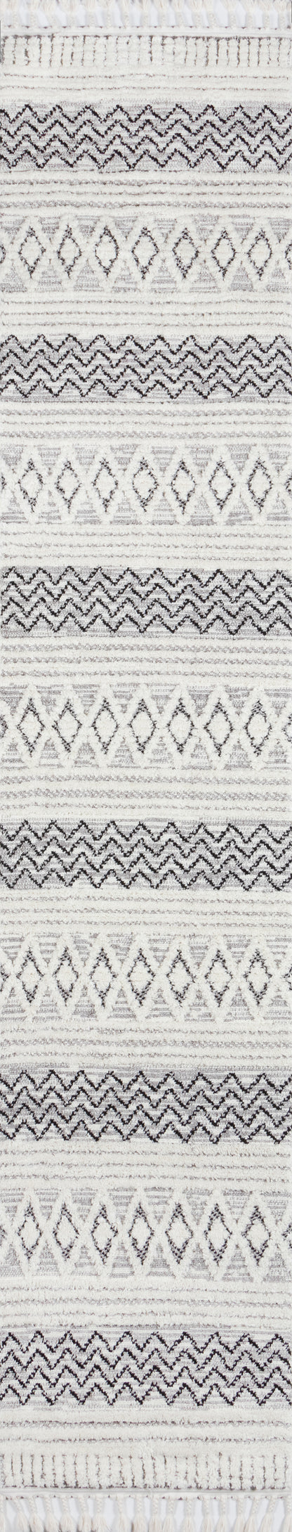 Light gray and ivory geometric area rug with diamond and chevron patterns, woven texture, fringe trim.