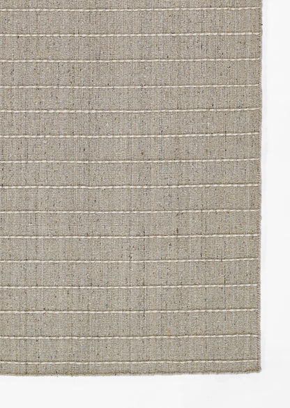 Natural beige jute rug with subtle white horizontal stripes, textured flat-weave, rustic organic look.