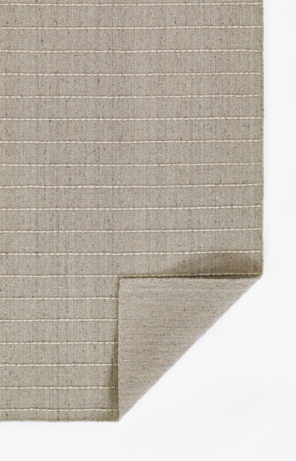 Olive-toned flatweave rug with thin white horizontal stripes; woven texture, folded corner.